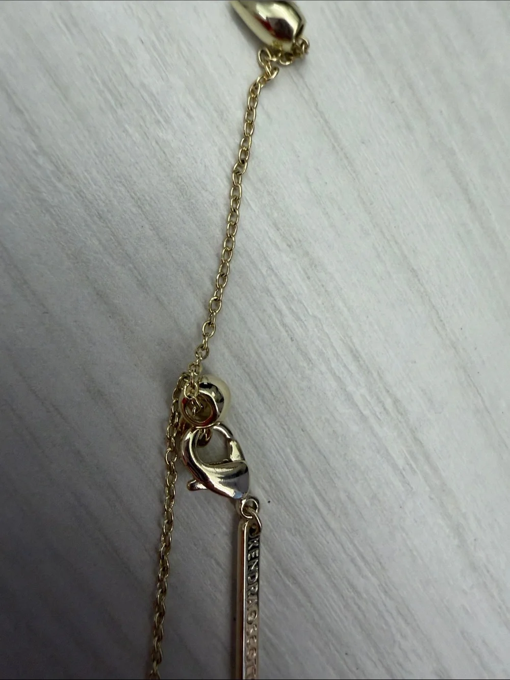Kendra Scott gold tone